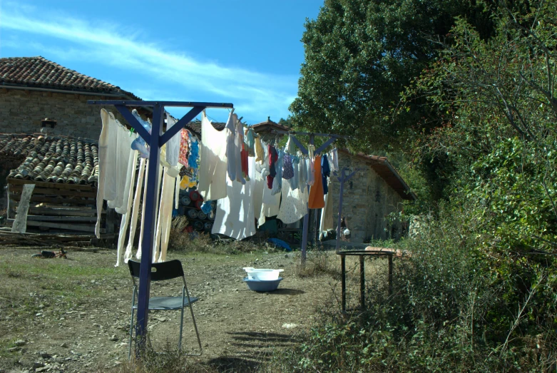 clothes hanging outside and outside near buildings