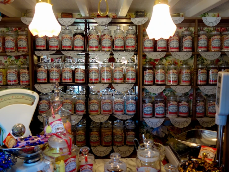 a spice shop with several jars and lights