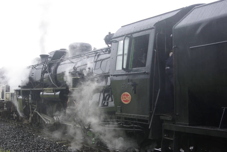 steam pouring out the steam train blowing through