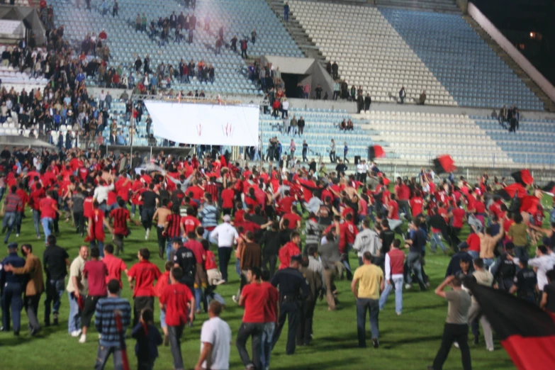 a large group of people at a football game