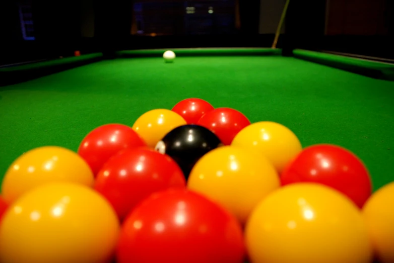 a pool table with several different colored balls