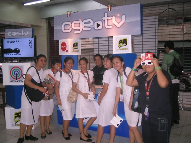 a group of women posing for a picture at an event