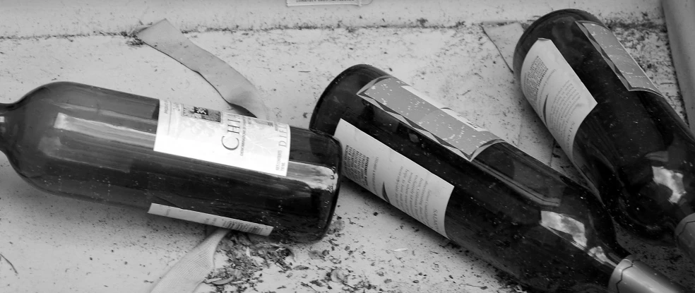 an up close picture of two bottle and a knife