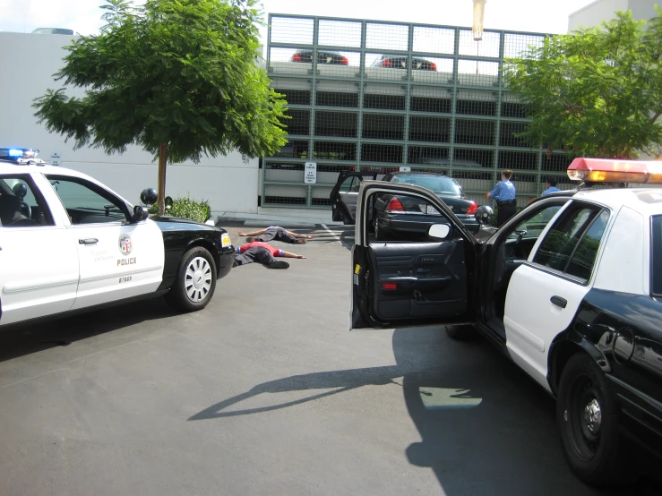 the truck and the car were taken apart in the parking lot