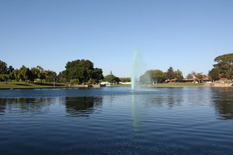 the fountain is very tall and it has an elaborate setting