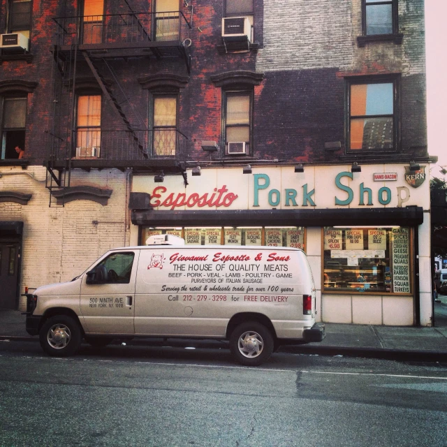 white truck parked in front of empty park shop