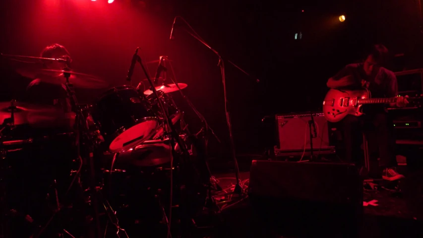 the band playing their instruments on stage