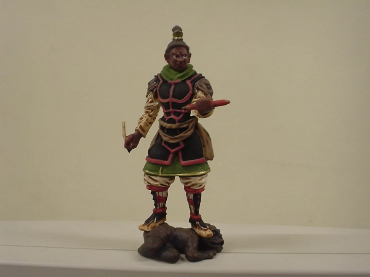 statue of a man in a native costume