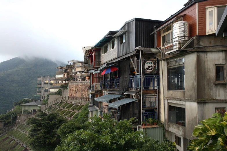 several residential buildings are built along the steep slope