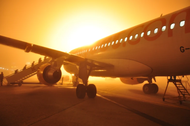 a plane is preparing to take off on a hazy day