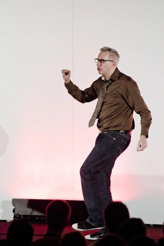 a man riding a skateboard on top of a hard surface