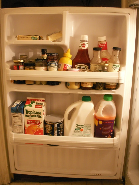 an open refrigerator with food items inside