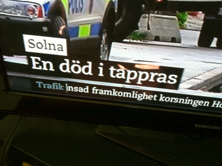 a television screen with a news report about what it is doing