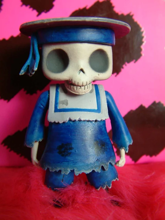 there is a skeleton in an overall suit with a hat on