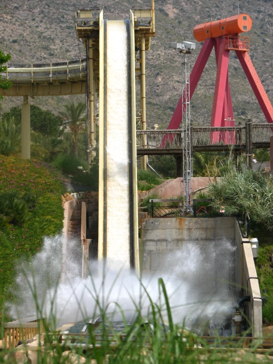 a large fire hydrant spewing out water into the air