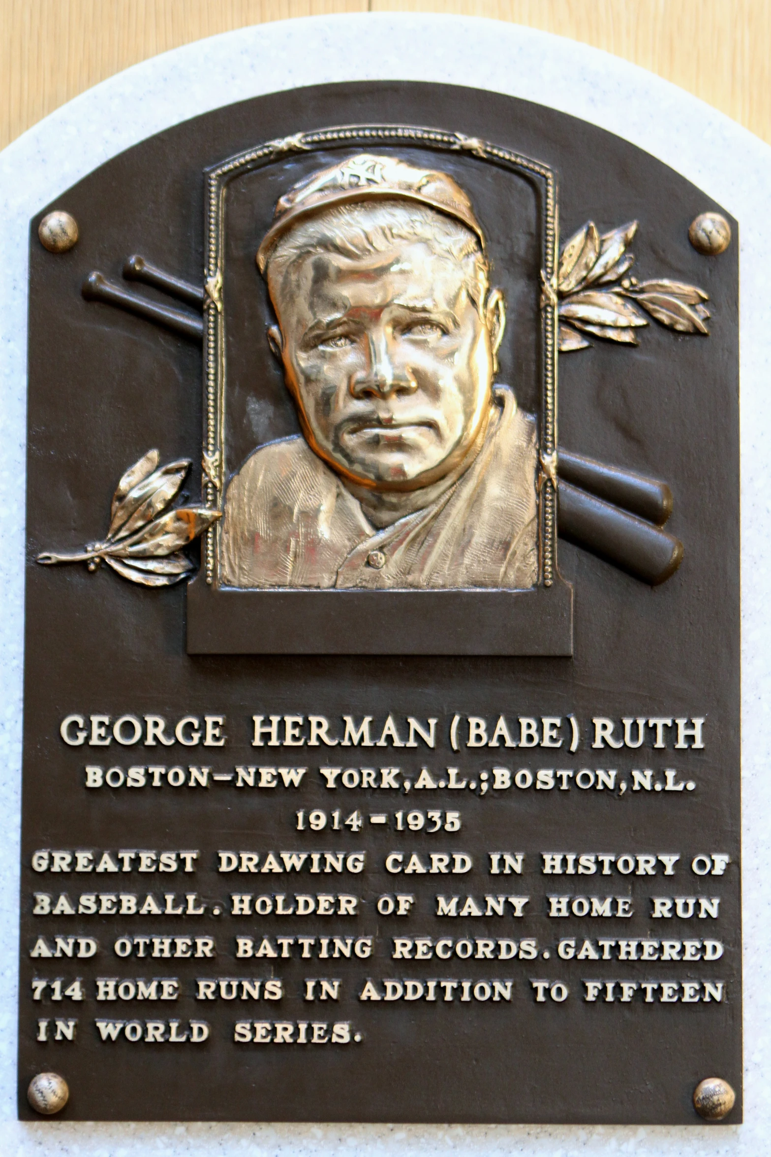 the plaque is set on a table displaying his father