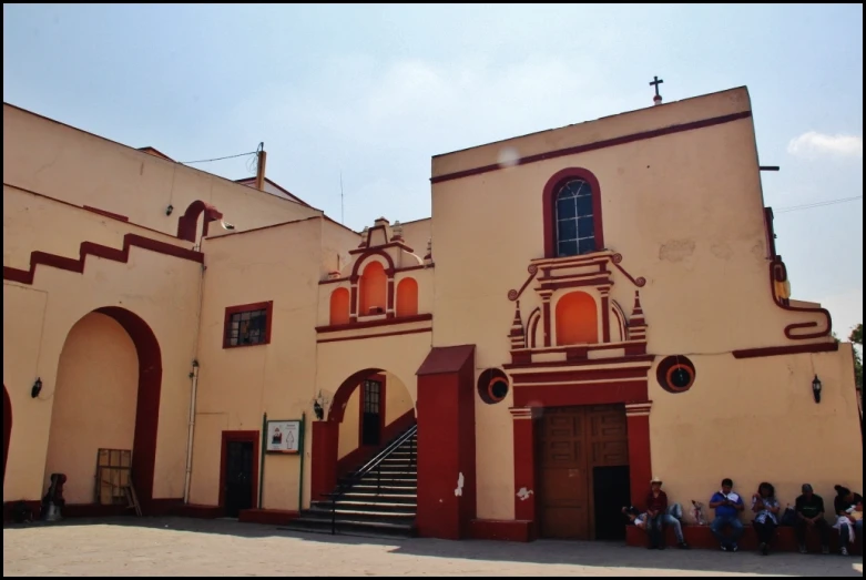 there is a very large church that has people outside