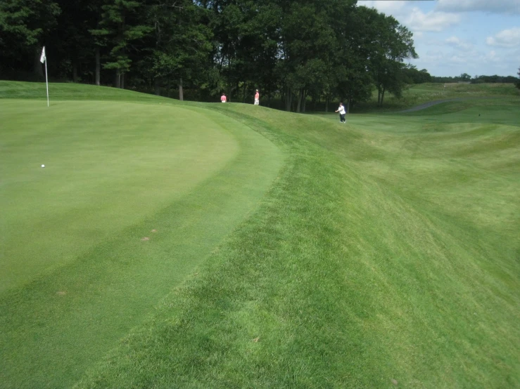 a golf course on the edge of a hill