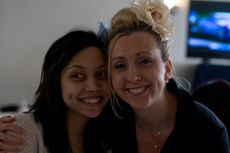 two smiling women pose for a picture together