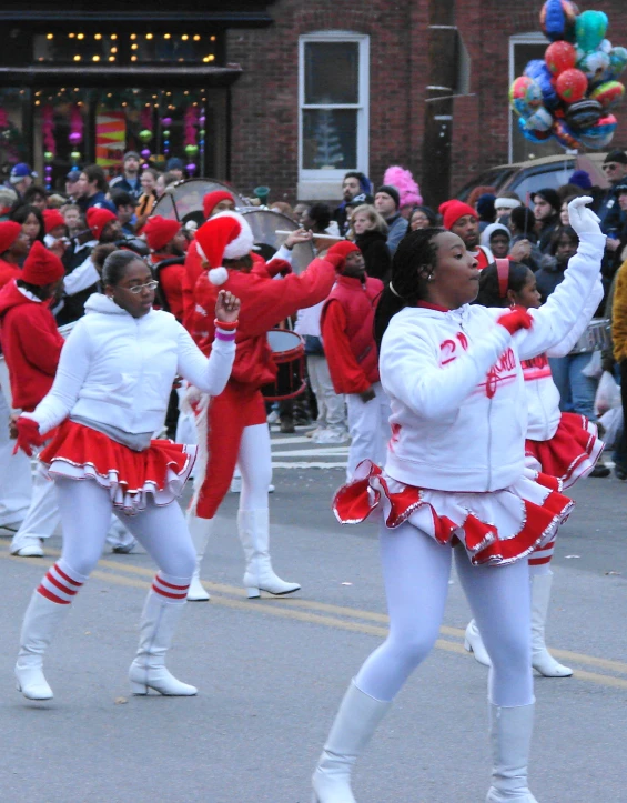 the performers are doing their thing in a parade