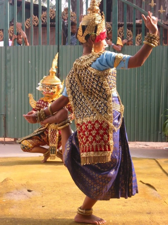 women perform a traditional dance at an outdoor event