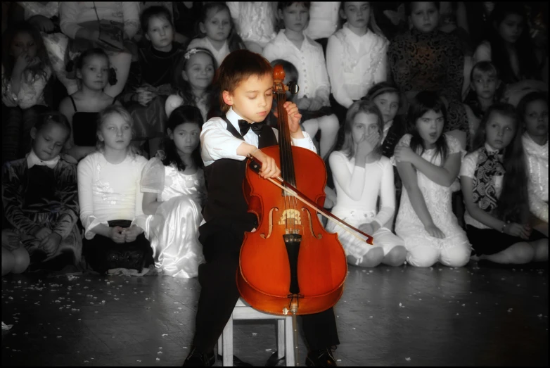 a  plays the cello at an event
