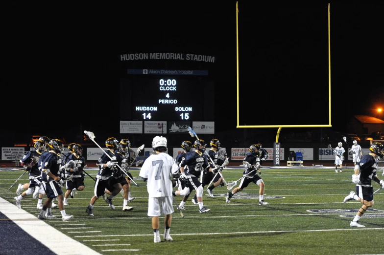 the football team huddles together in a game