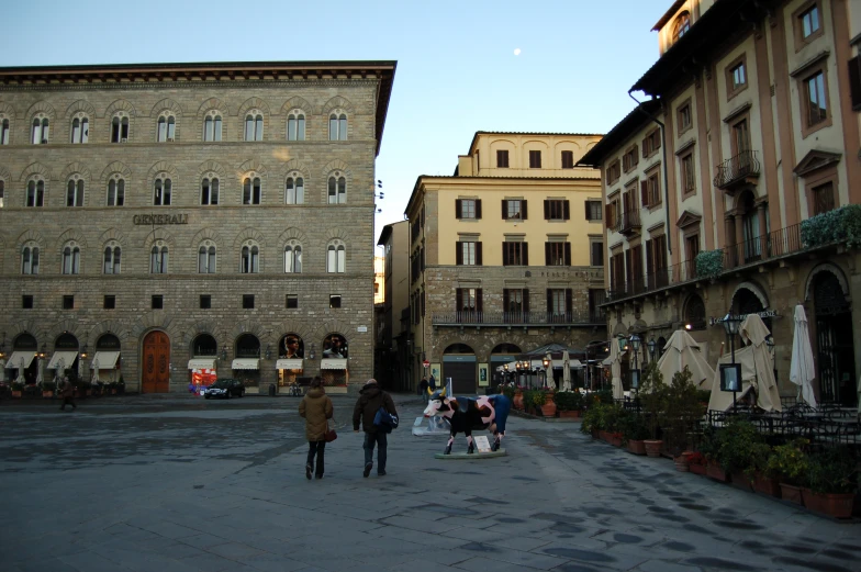 an image of people walking in the street