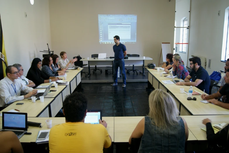 group of people working in an office area