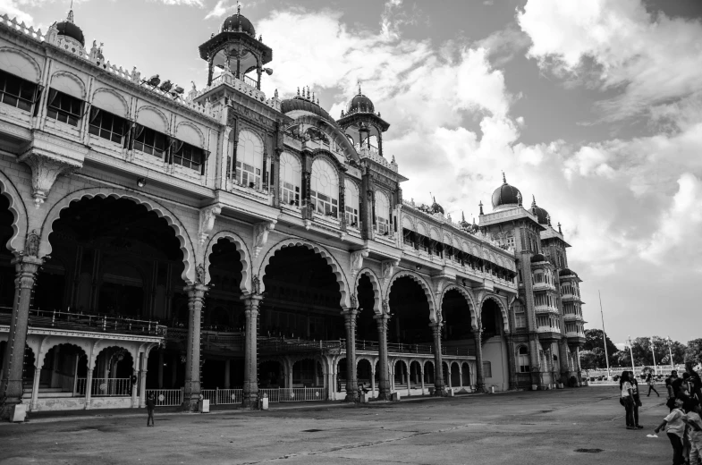 a black and white po of a building with clocks on it