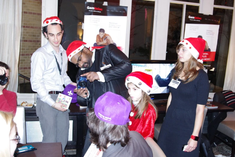 a bunch of people dressed up in santa hats