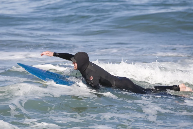 a person on a surfboard in the water