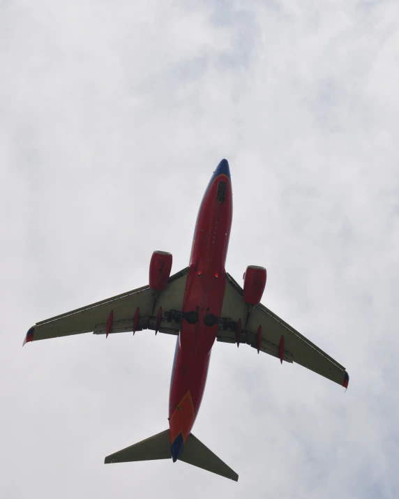 an airplane flying high up in the sky