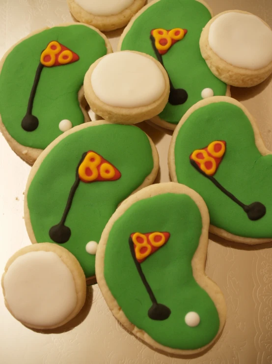 a close up of some decorated cookies on a table