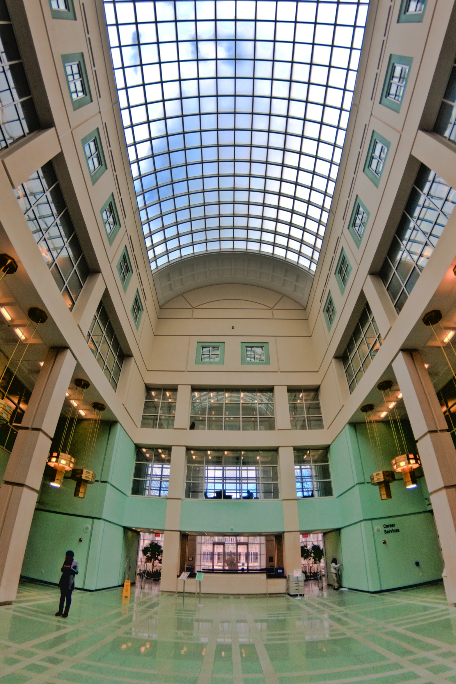 there is a huge room with a skylight high in the ceiling