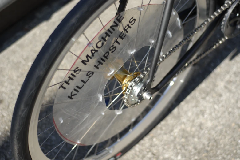 the back tire of a bike that has writing on it