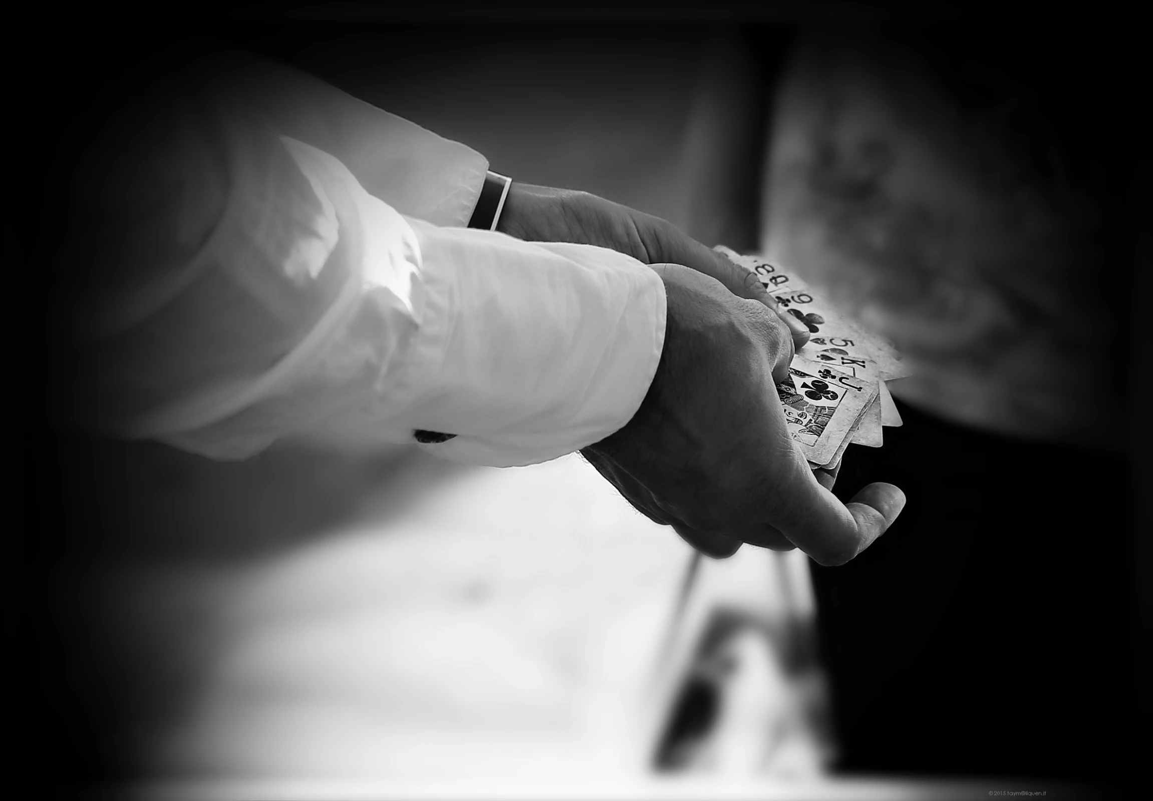 black and white pograph of hands holding soing