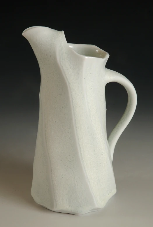 a ceramic pitcher that is not white