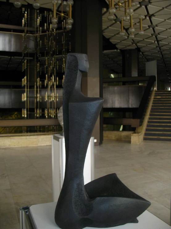 a large sculpture sitting on top of a white table