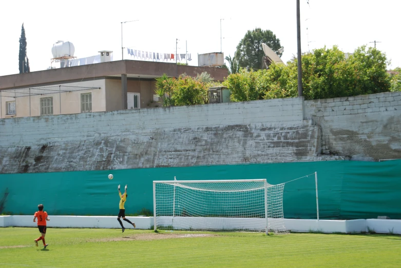 there is a soccer goal next to the net