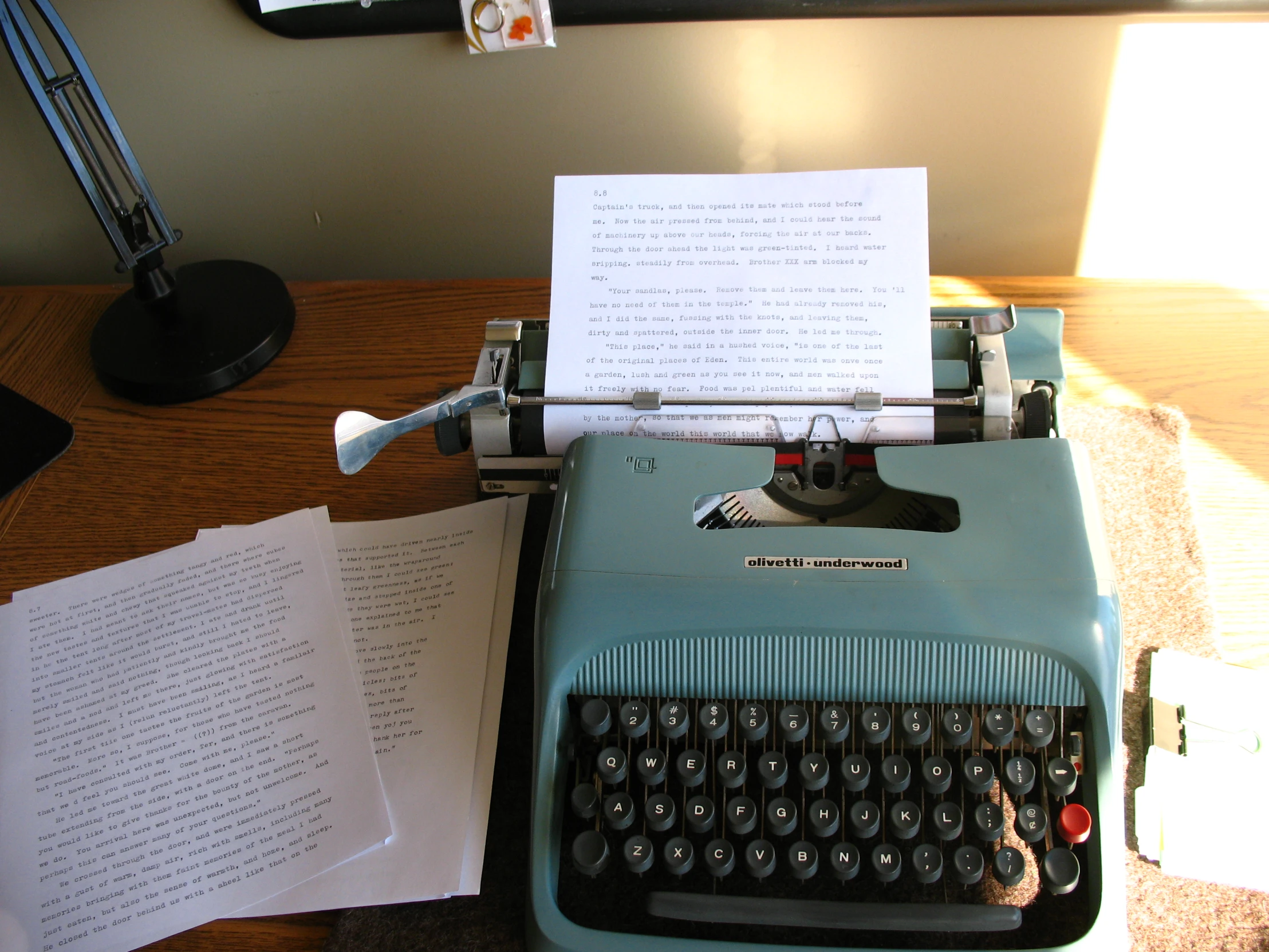 a close up of a typewriter on a desk