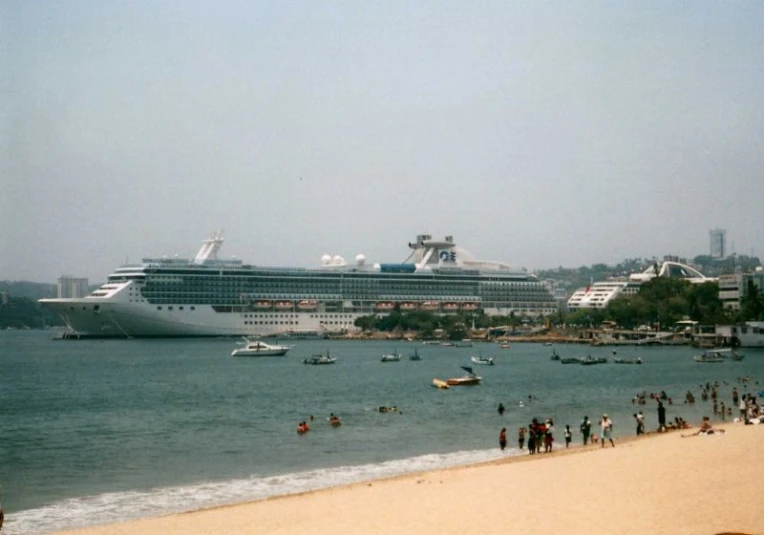 two cruise ships in a large body of water