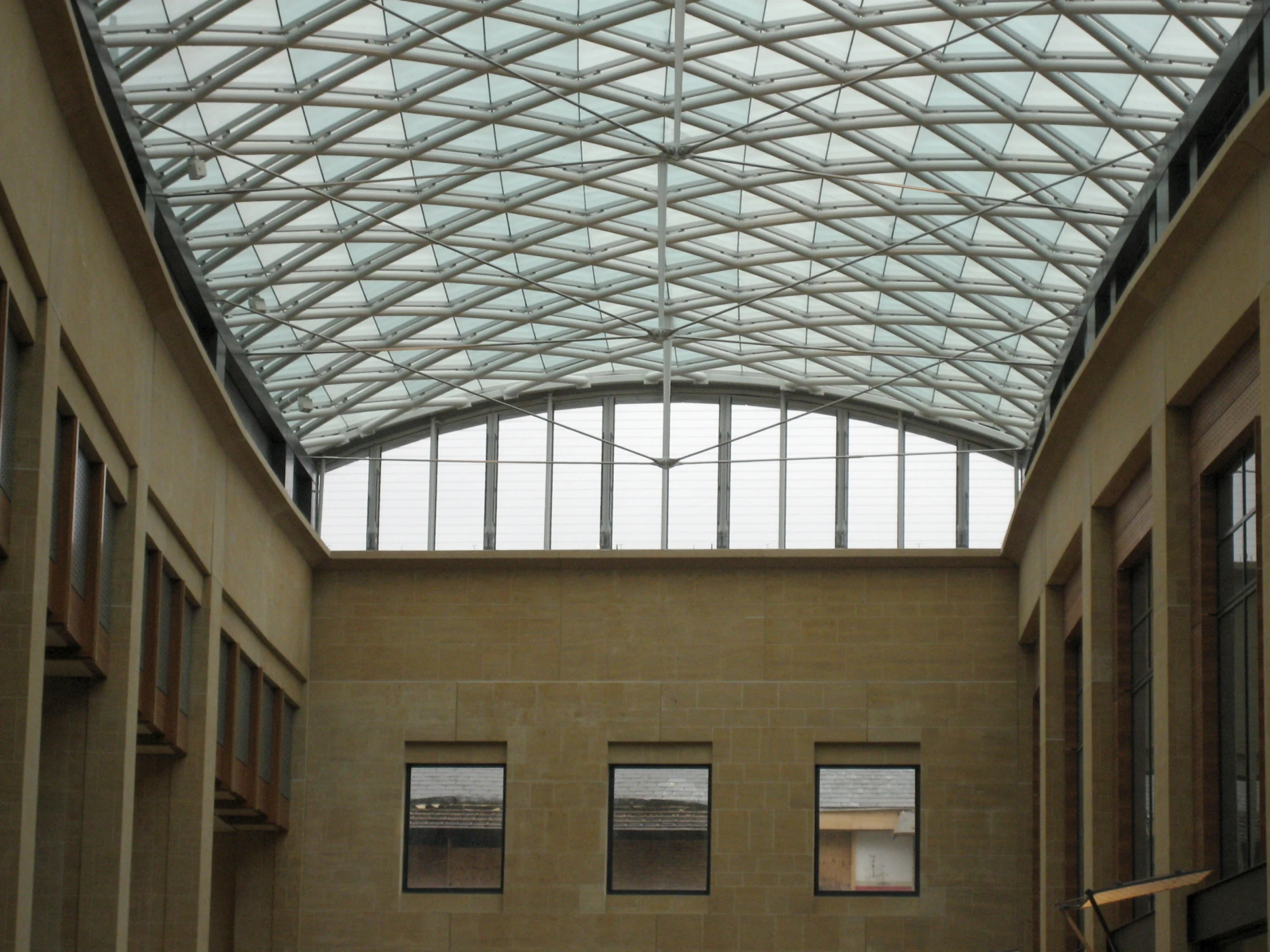 a building has three windows and an iron roof