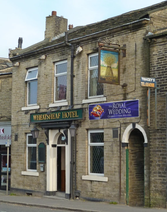 the front of a pub on the side of a street