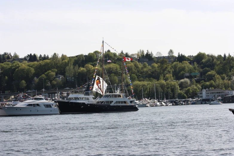 two ships docked at the harbor in the summer