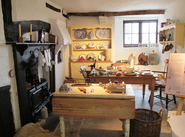 a room with various objects and display cases