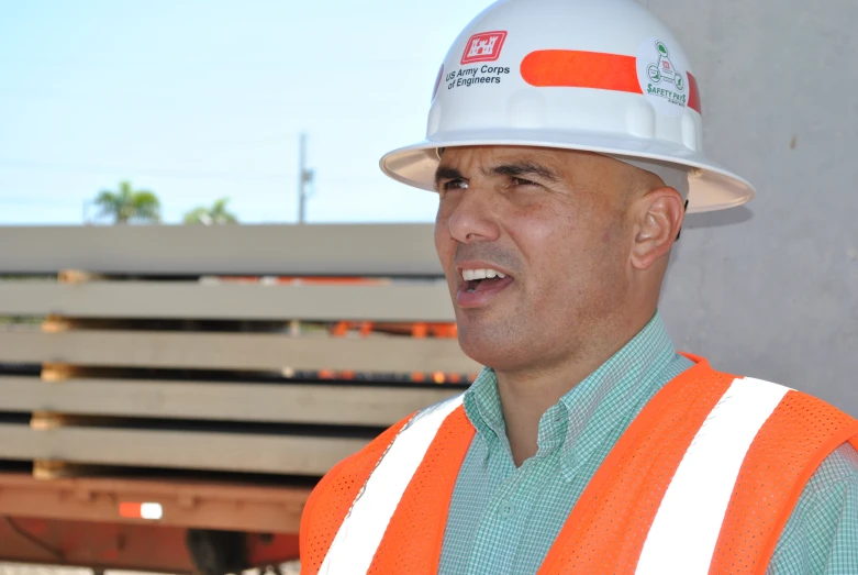 a construction worker wearing a white hard hat