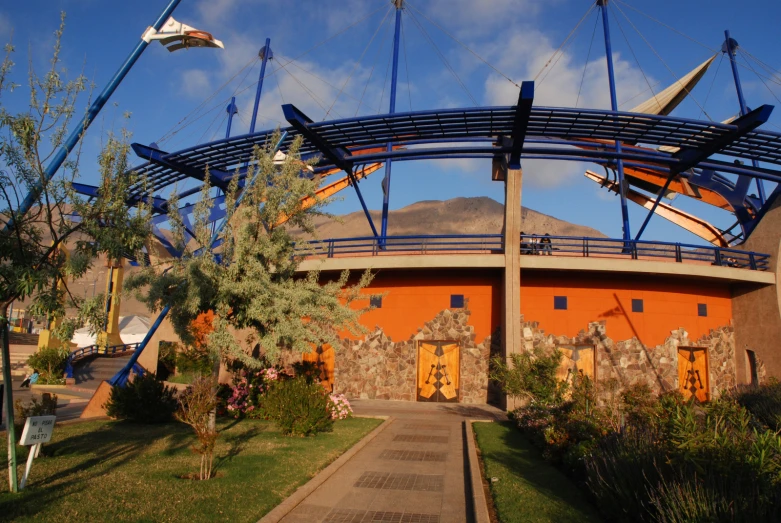 a building with some surfboards mounted to the top