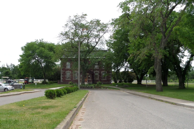 a small church that is sitting in the grass