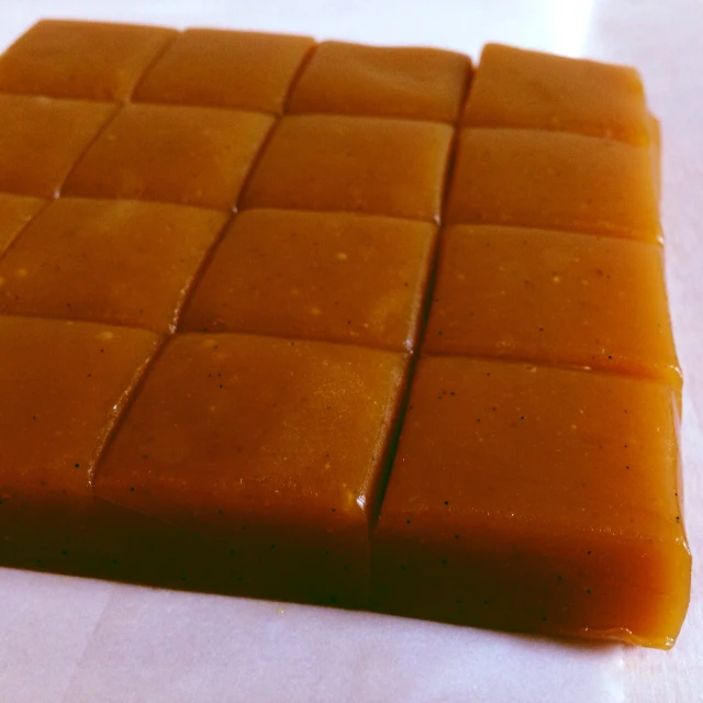 a square piece of ered caramel candy